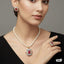 Luxurious single-strand pearl choker with statement centerpiece and matching earrings, priced Rs. 2050