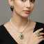 Luxurious single-strand pearl choker with statement centerpiece and matching earrings, priced Rs. 2050