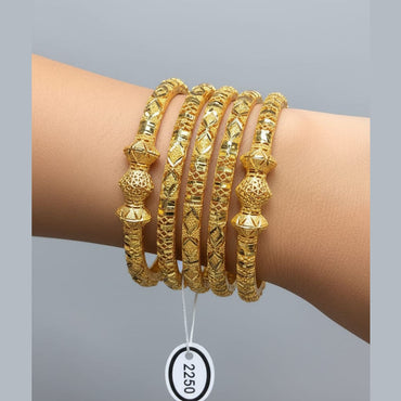 Dual-Tone Textured Gold Bangles with Diamond Accents – Rs. 2250