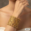 Ornate Roller-Textured Gold Bangle Stack – Rs. 2,250