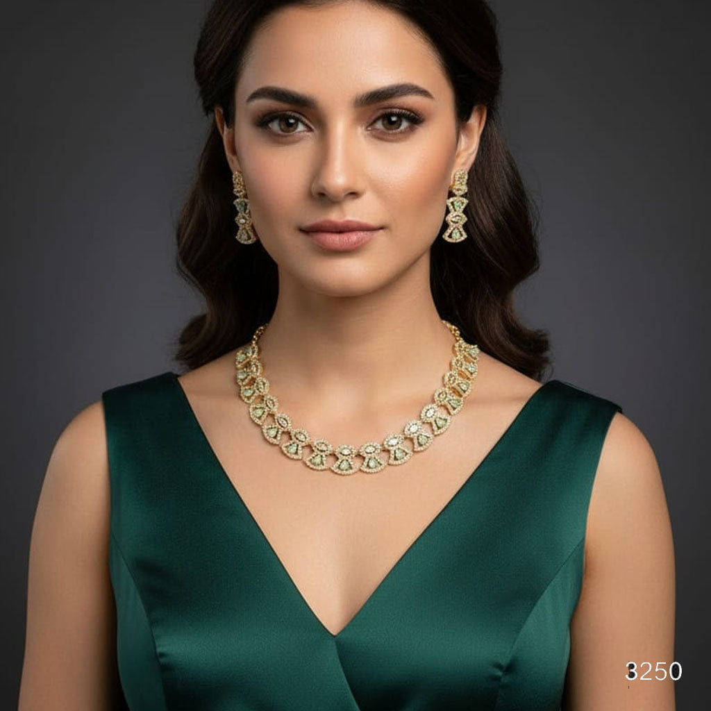 Ornate Gold Tone Scallop Necklace & Drop Earrings – Rs. 3,250