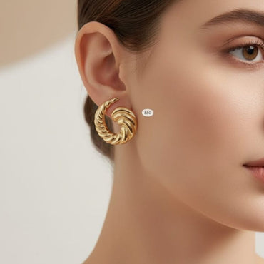Bold Gold Tone Twisted Croissant Stud Earrings – Rs. 850