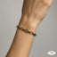 Oval Chain Bracelet with Texture Detail – Rs. 1,450