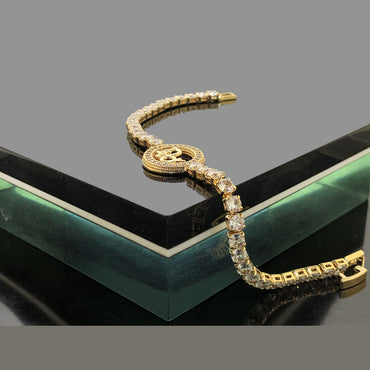 Gold and Silver-Tone CZ Tennis Bracelet with Round Charm – Rs. 850