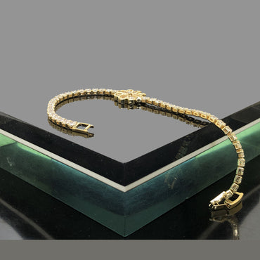 Gold CZ Bracelet with Bow Charm – Rs. 850