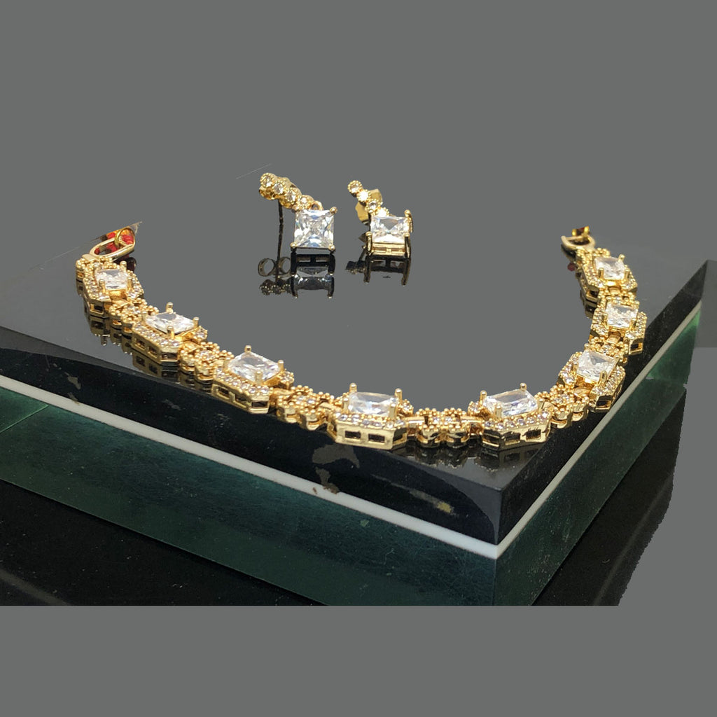 Elegant Gold-Tone Bracelet & Earring Set with Square White Stones – Rs. 1850