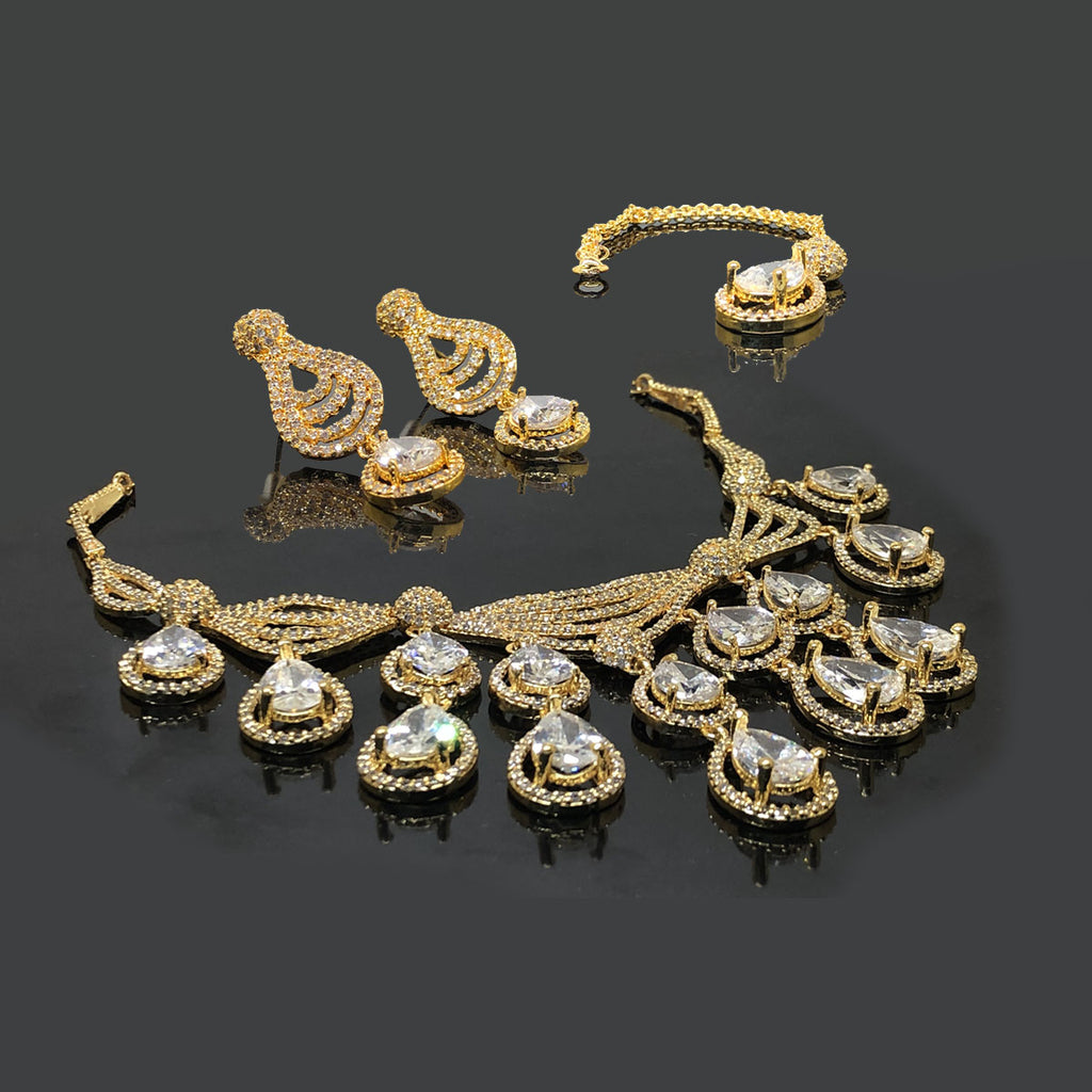 Golden Bridal Necklace Set with Clear Stones – Rs. 7850