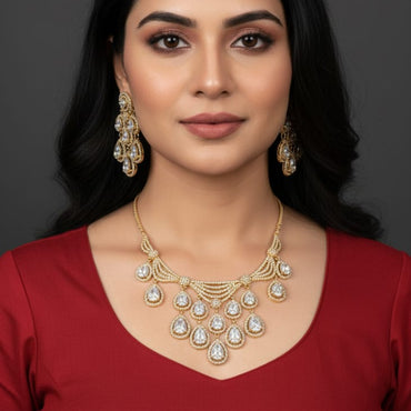 Golden Teardrop Tiered Cluster Statement Set – Rs. 6,850
