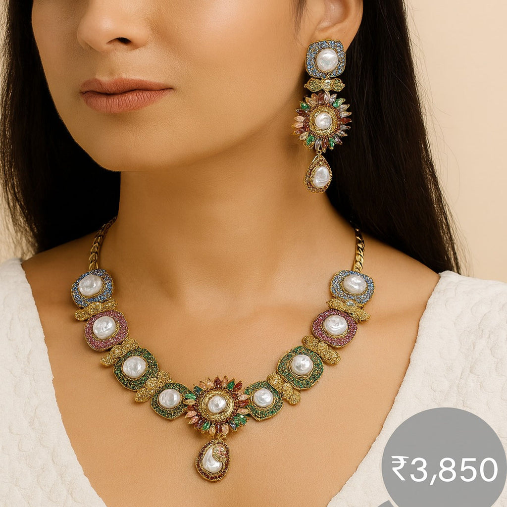 Pink & Pearl Necklace Set – *Rs. 3,850*
