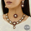 Pink & Pearl Necklace Set – *Rs. 3,850*