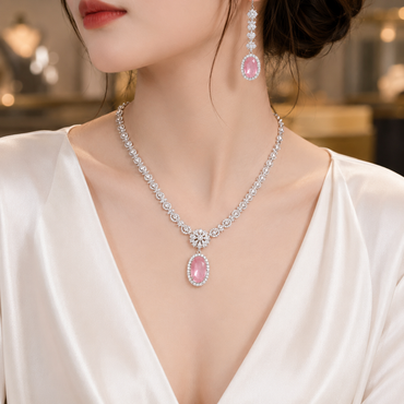 Pink stone American Diamond necklace set with matching drop earrings in silver tone