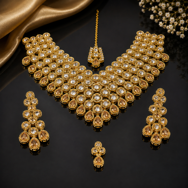 Golden American Diamond bridal choker set with matching earrings and maang tikka