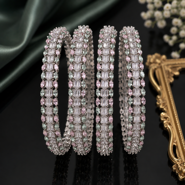 Pastel pink and mint green American Diamond bangles set with sparkling crystal detailing