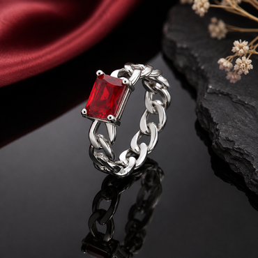 Silver-tone chain link ring with rectangular red stone centerpiece