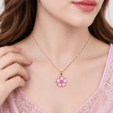Pink crystal flower pendant necklace with delicate rose gold tone chain