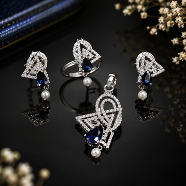 Royal blue sapphire-style AD jewelry set with pearl drop earrings and matching ring