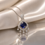 Elegant royal blue sapphire-style pendant necklace with sparkling crystal detailing