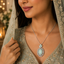 Elegant blue crystal floral pendant necklace with sparkling silver-tone detailing