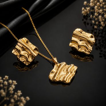 Golden wave textured pendant necklace with matching abstract earrings