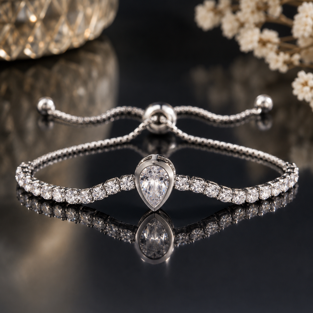 Silver crystal bracelet with teardrop centerpiece and sparkling stones