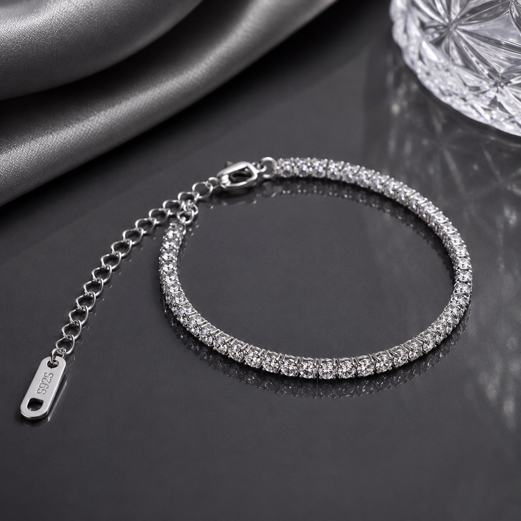 Elegant crystal tennis bracelet in gold and silver tone