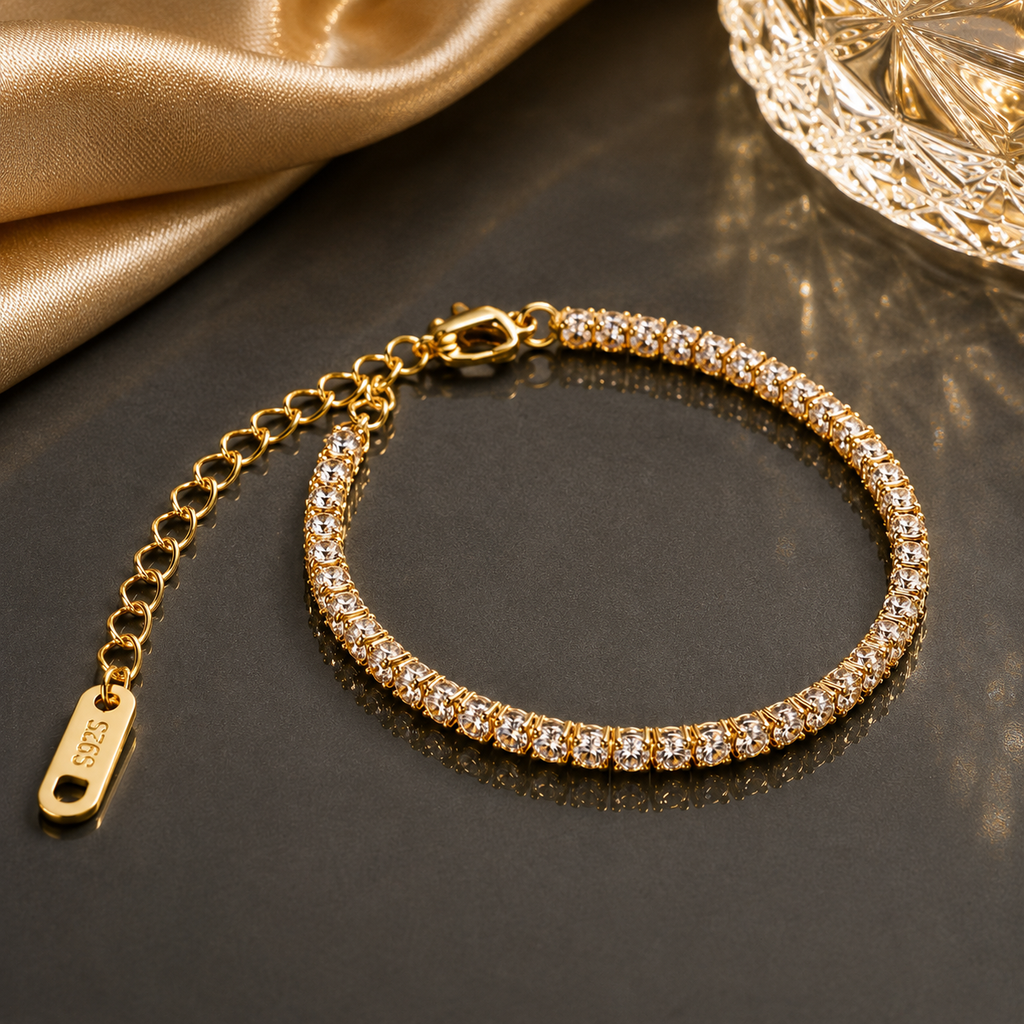 Elegant crystal tennis bracelet in gold and silver tone