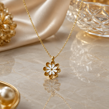 Elegant gold floral pendant necklace with white flower detailing