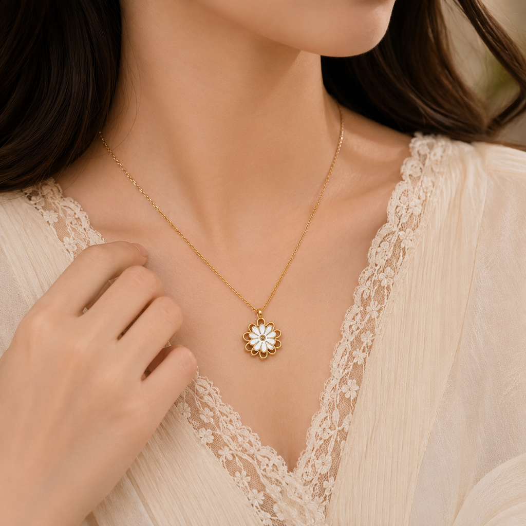 Elegant gold floral pendant necklace with white flower detailing