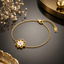 Elegant gold floral bracelet with white flower detailing for women