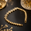 Elegant gold crystal floral bracelet with sparkling stone detailing