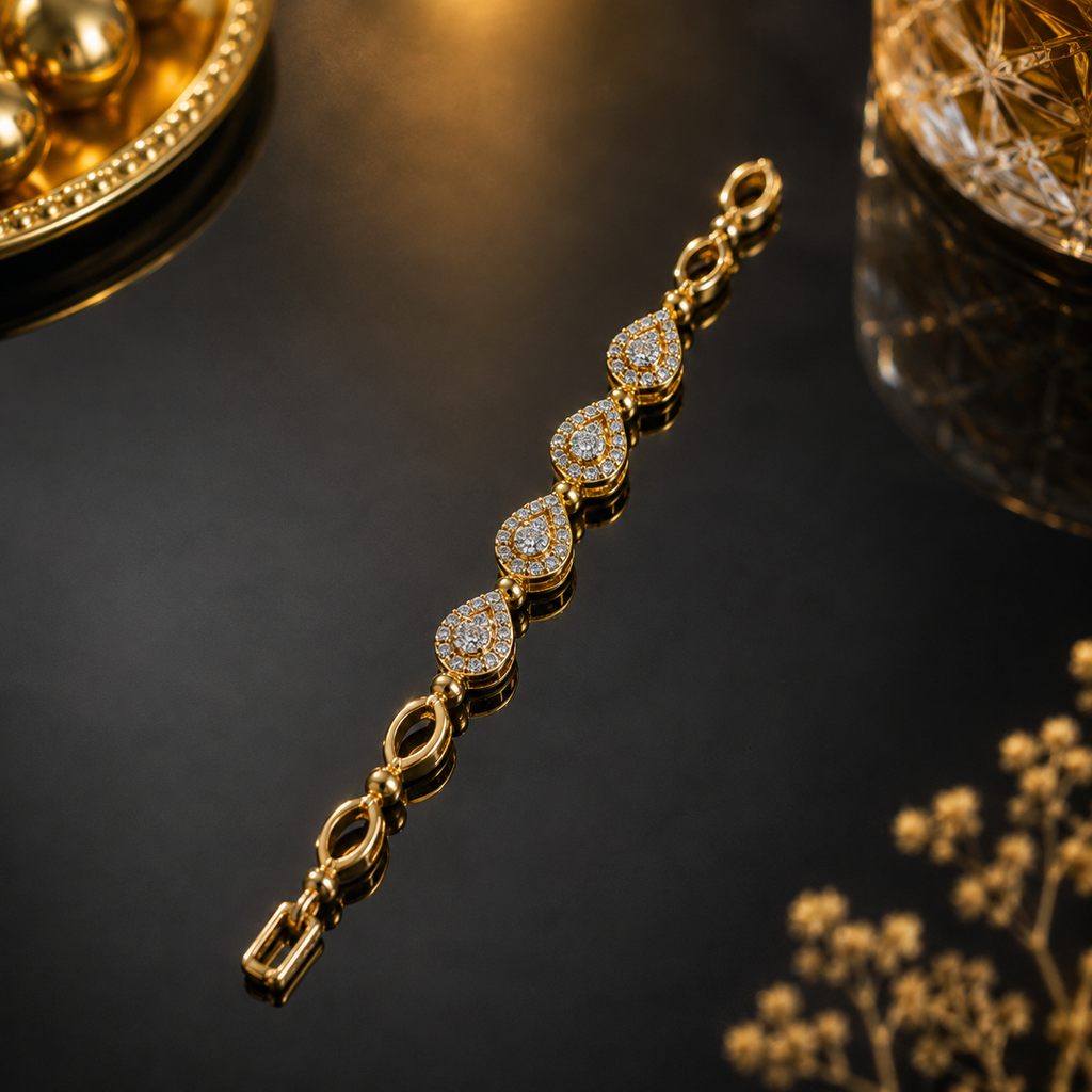 Elegant gold teardrop crystal bracelet with sparkling stone detailing