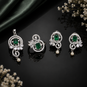 Emerald green floral pendant earrings and matching ring jewelry set with pearl drops