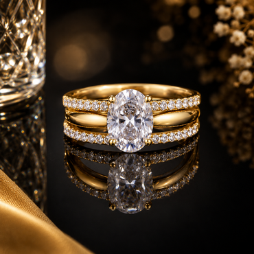 Golden triplet American diamond ring with large oval-cut center stone and sparkling triple bands