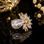 Elegant floral teardrop statement ring with sparkling stone detailing