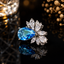 Elegant floral teardrop statement ring with sparkling stone detailing