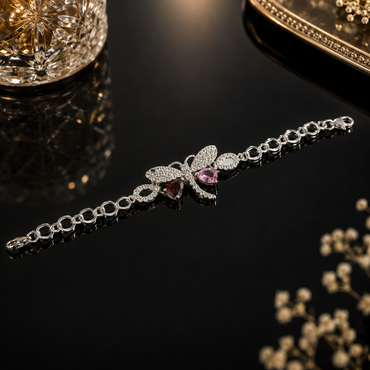 Silver butterfly crystal bracelet with pink and red heart-shaped stones