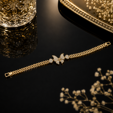 Elegant gold butterfly crystal bracelet with sparkling herringbone-style links