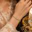 Elegant gold butterfly crystal bracelet with sparkling herringbone-style links