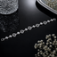 Silver-tone beaded bracelet with sparkling heart-shaped crystal accents