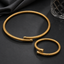 Golden ribbed snake chain necklace with matching hand cuff jewelry set