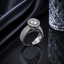 Silver CZ oval halo statement ring with sparkling center stone and detailed band