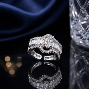 Silver CZ oval halo statement ring with baguette-style side stones and sparkling detailing