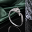 Luxury leopard head CZ cuff bracelet with sparkling stones and green eye accents in gold and silver-tone finishes