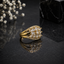 Elegant gold floral CZ statement ring with marquise-cut sparkling stones and intricate detailing