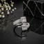 Elegant silver CZ open cuff statement ring with baguette-style center stones and sparkling crystal detailing