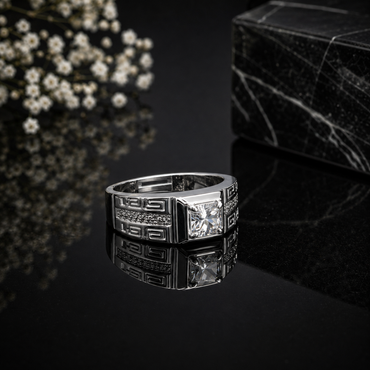 Elegant silver geometric CZ statement ring with square-cut center stone, pavé detailing and modern pattern design