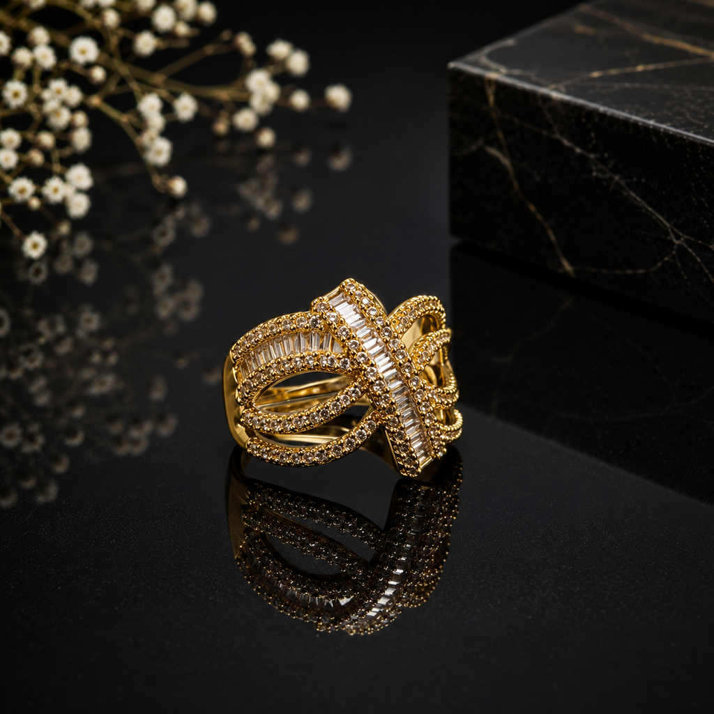 Elegant gold baguette CZ statement ring with geometric design, sparkling pavé detailing and rectangular stone accents