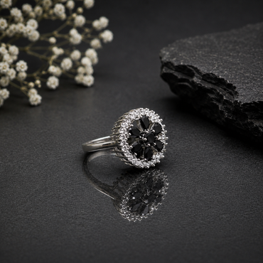 Black flower CZ statement ring with faceted black stones and silver-tone setting