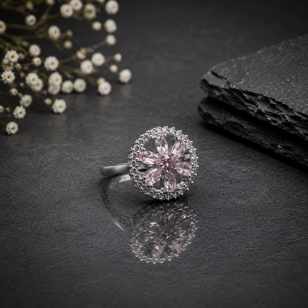 Elegant silver pink floral CZ ring with marquise-cut pink stones, sparkling CZ border and flower-inspired design
