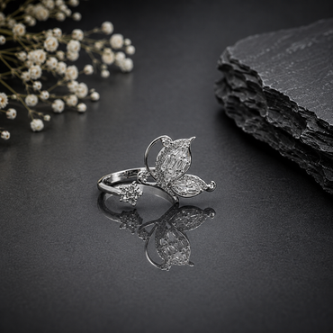 Elegant silver butterfly CZ statement ring with sparkling floral detailing and sleek silver-tone finish